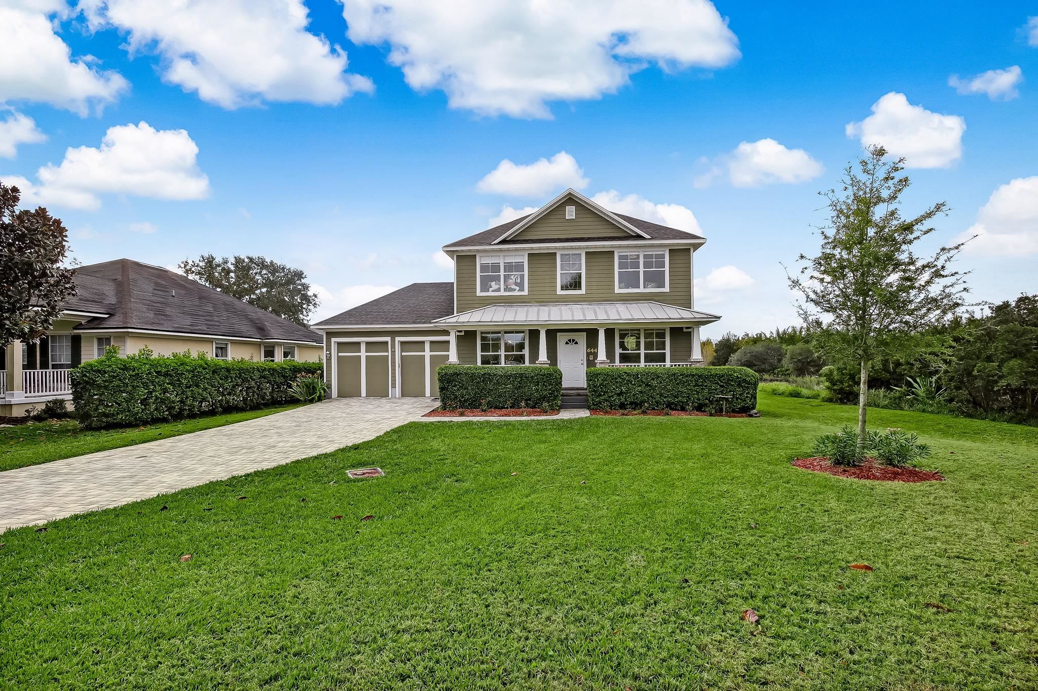 644 Sun Down Circle St. Augustine, FL 32080 - Photo 5 of 69 a front view of a house with a yard