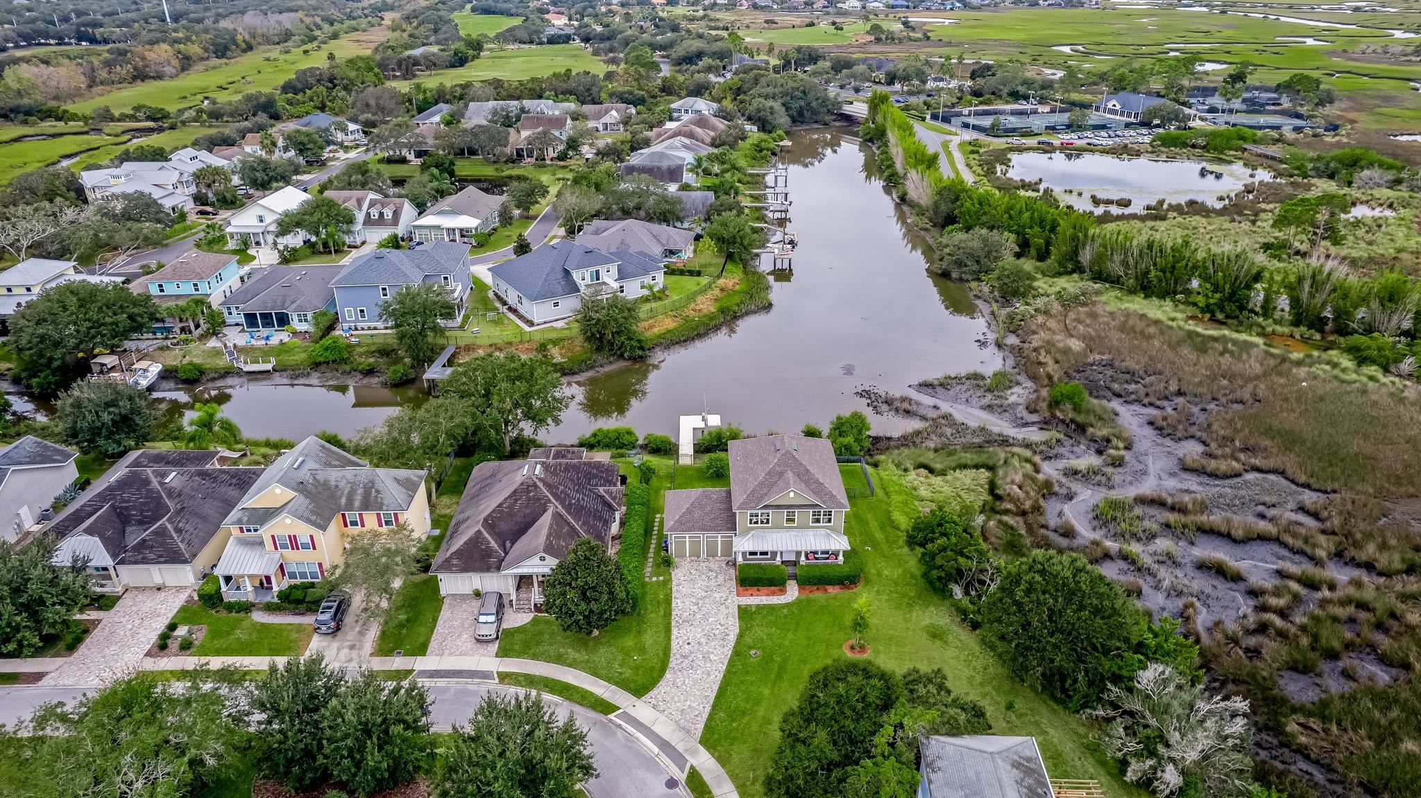 644 Sun Down Circle St. Augustine, FL 32080 - Photo 58 of 69 an aerial view of residential houses with outdoor space and trees