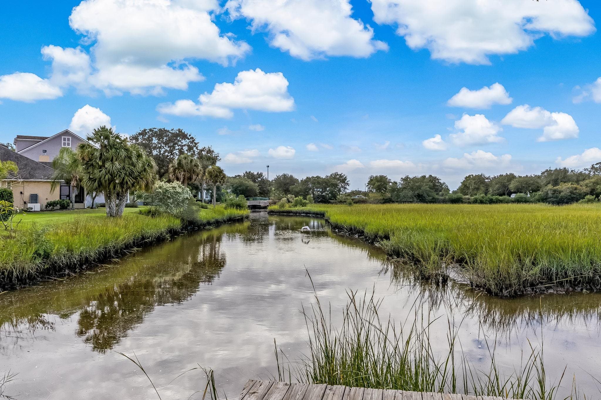 644 Sun Down Circle St. Augustine, FL 32080 - Photo 68 of 69 a view of a lake with houses in the back