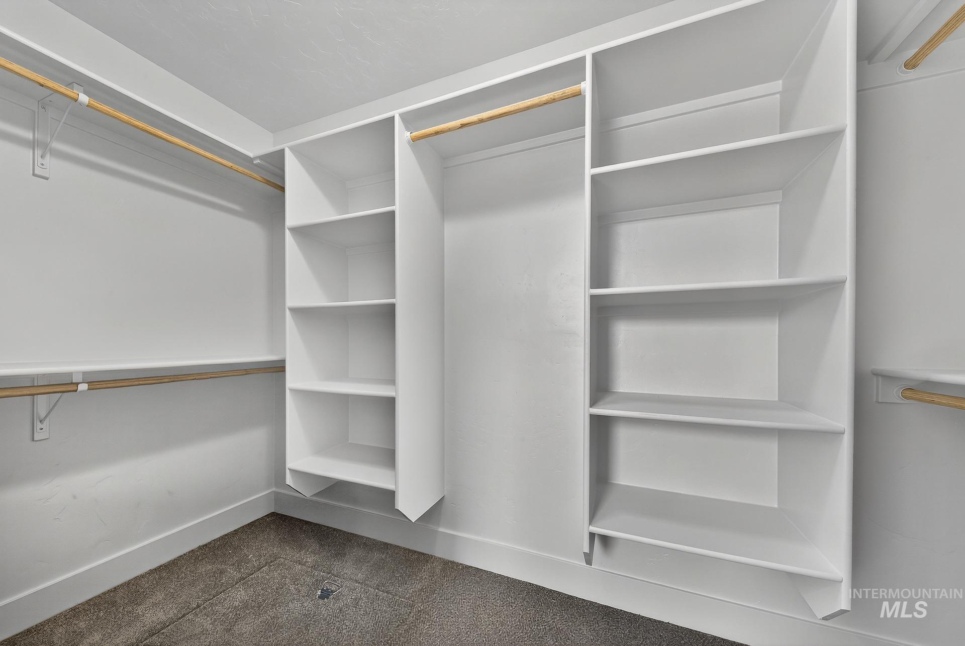 1164 Velvet Loop Wilder, ID 83676 - Photo 20 of 35 Walk in closet with dark colored carpet