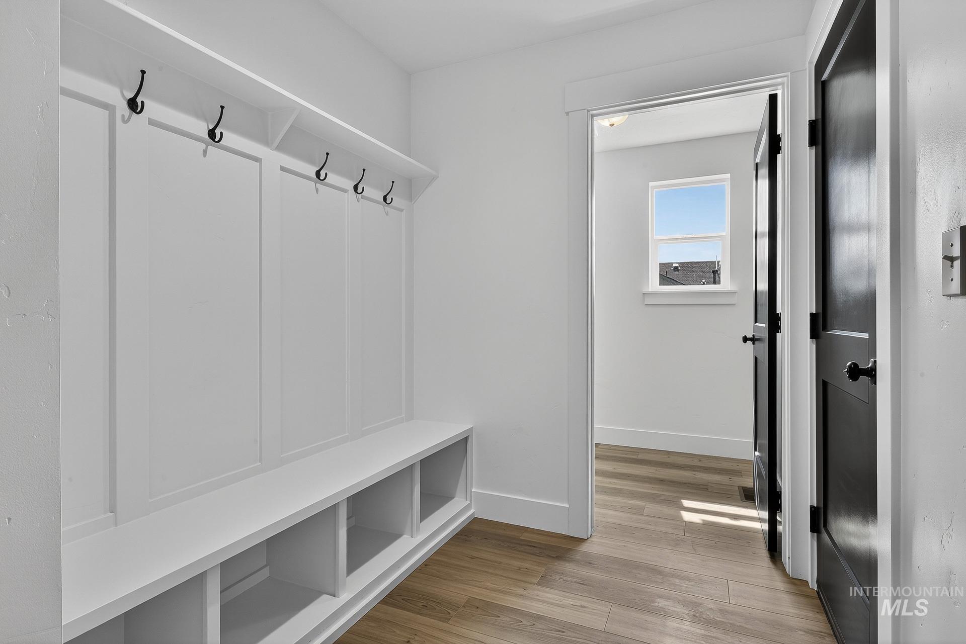 1164 Velvet Loop Wilder, ID 83676 - Photo 29 of 35 Mudroom with light wood finished floors and baseboards