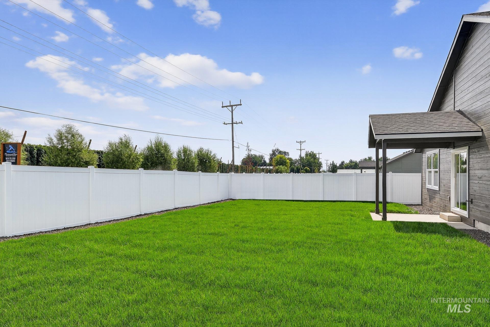 1164 Velvet Loop Wilder, ID 83676 - Photo 31 of 35 Fenced backyard featuring a patio area