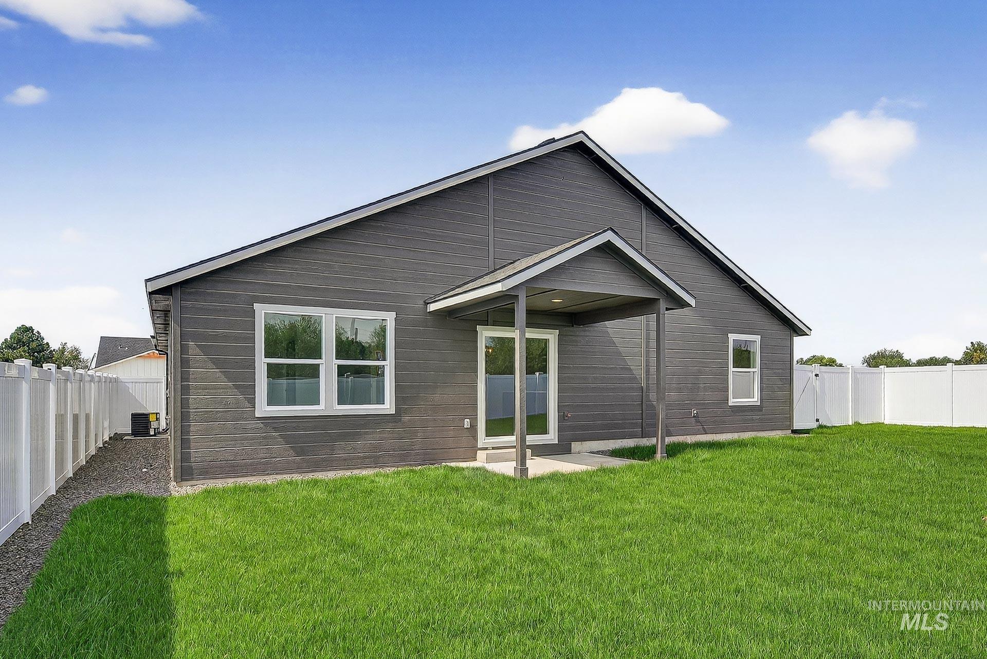 1164 Velvet Loop Wilder, ID 83676 - Photo 34 of 35 Back of house featuring a fenced backyard