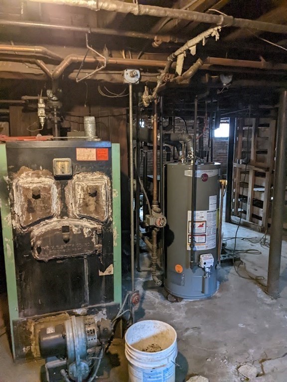 73-75 Sylvan Street Springfield, MA 01108 - Photo 13 of 15 a view of store room with washer and dryer
