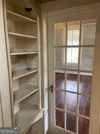 a view of a room with rack on the wall