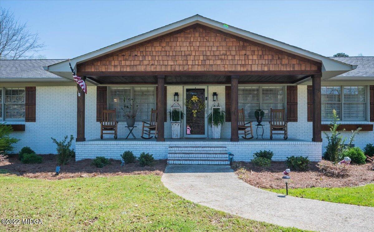 1397 Juliette Road Forsyth, GA 31029 - Photo 4 of 46 front view of a house with a yard