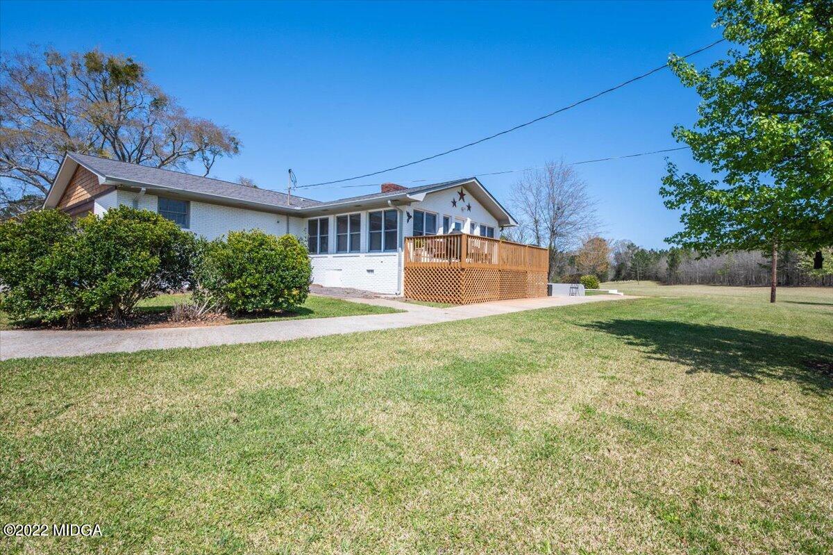 1397 Juliette Road Forsyth, GA 31029 - Photo 8 of 46 a front view of a house with garden