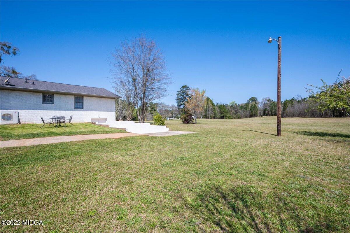 1397 Juliette Road Forsyth, GA 31029 - Photo 10 of 46 a view of a house with a yard