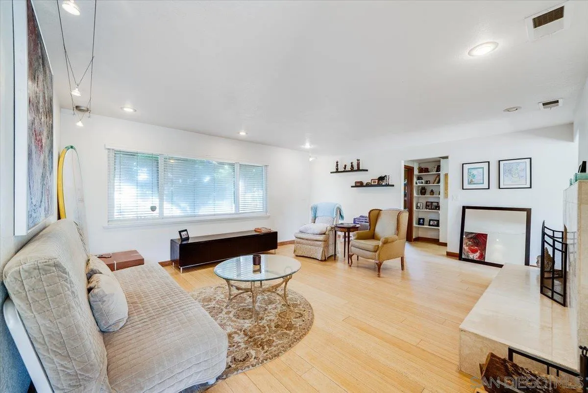 1386 Lake Drive Encinitas, CA 92024 - Photo 12 of 60 a living room with furniture or couch and a fireplace
