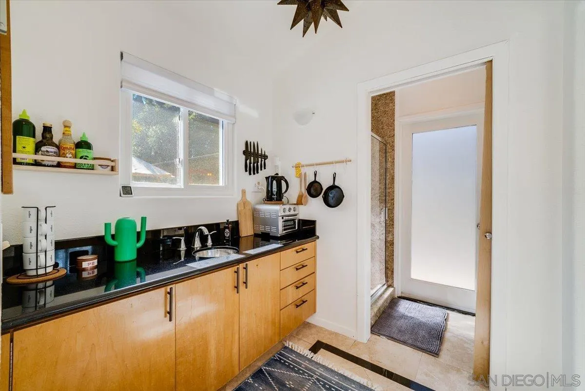 1386 Lake Drive Encinitas, CA 92024 - Photo 36 of 60 a kitchen with sink and window