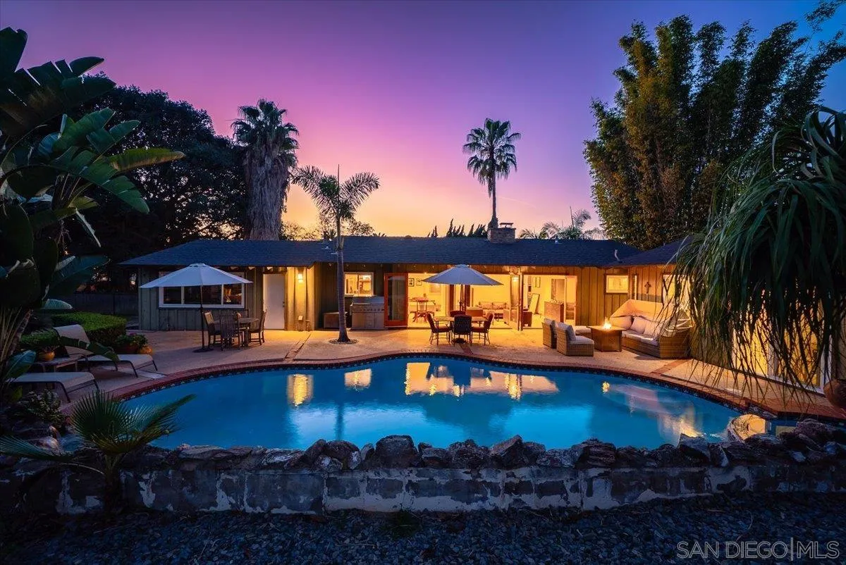 1386 Lake Drive Encinitas, CA 92024 - Photo 4 of 60 a view of a house with swimming pool and a yard
