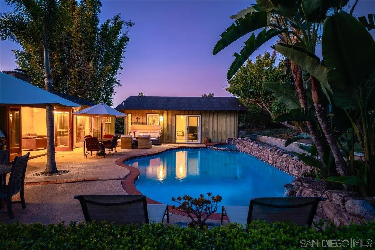 1386 Lake Drive Encinitas, CA 92024 - Photo 44 of 60 a view of a chairs and table in the patio and a swimming pool