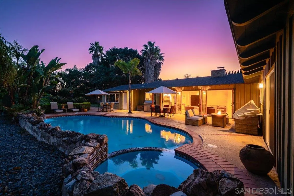 1386 Lake Drive Encinitas, CA 92024 - Photo 45 of 60 a view of a swimming pool with an outdoor seating