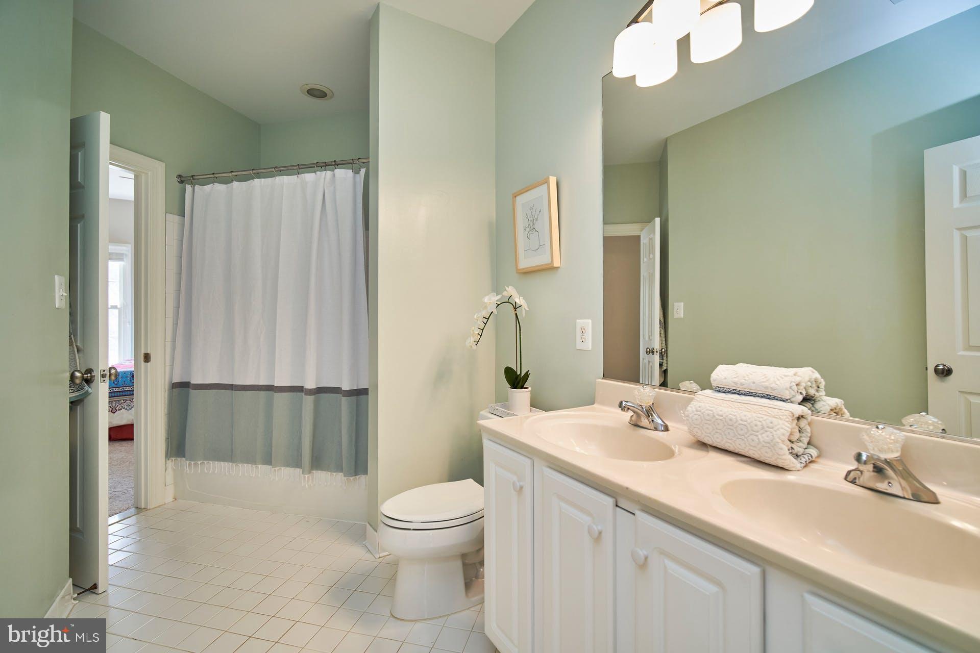 7436 Spring Summit Road Springfield, VA 22150 - Photo 31 of 46 3rd bathroom Jsck/Jill bathroom with 2 vanities