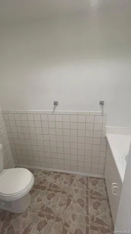 a bathroom with a toilet