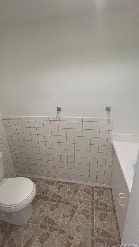 a bathroom with a toilet