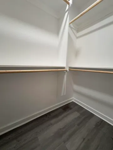 a view of an empty walk in closet