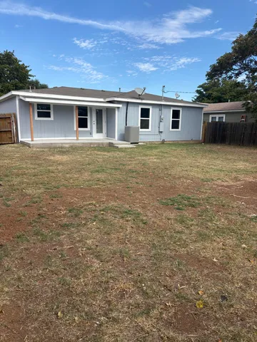 a outdoor space with pool and view of a house