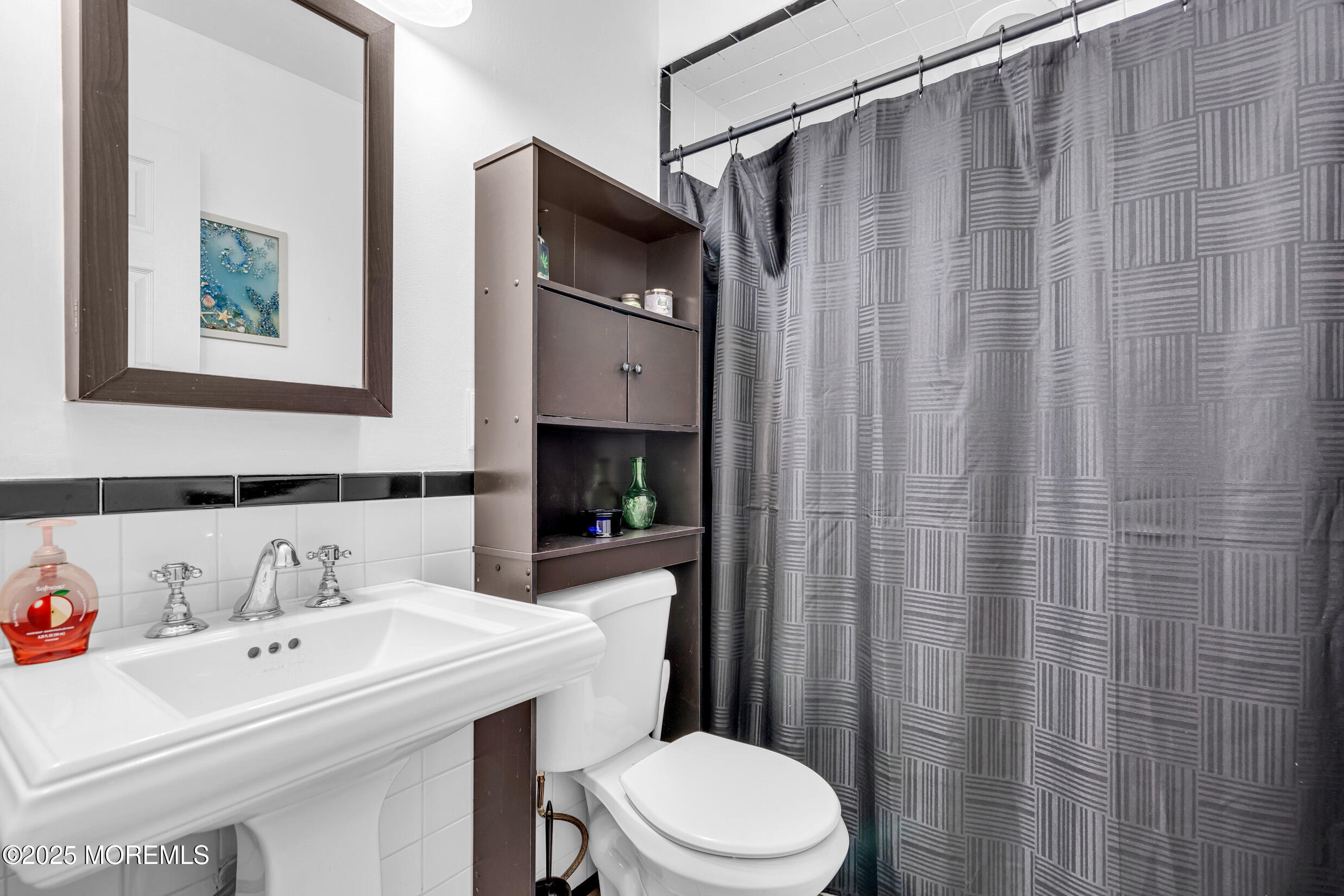 1541 Commonwealth Boulevard Toms River, NJ 08757 - Photo 18 of 34 a bathroom with a sink toilet and shower