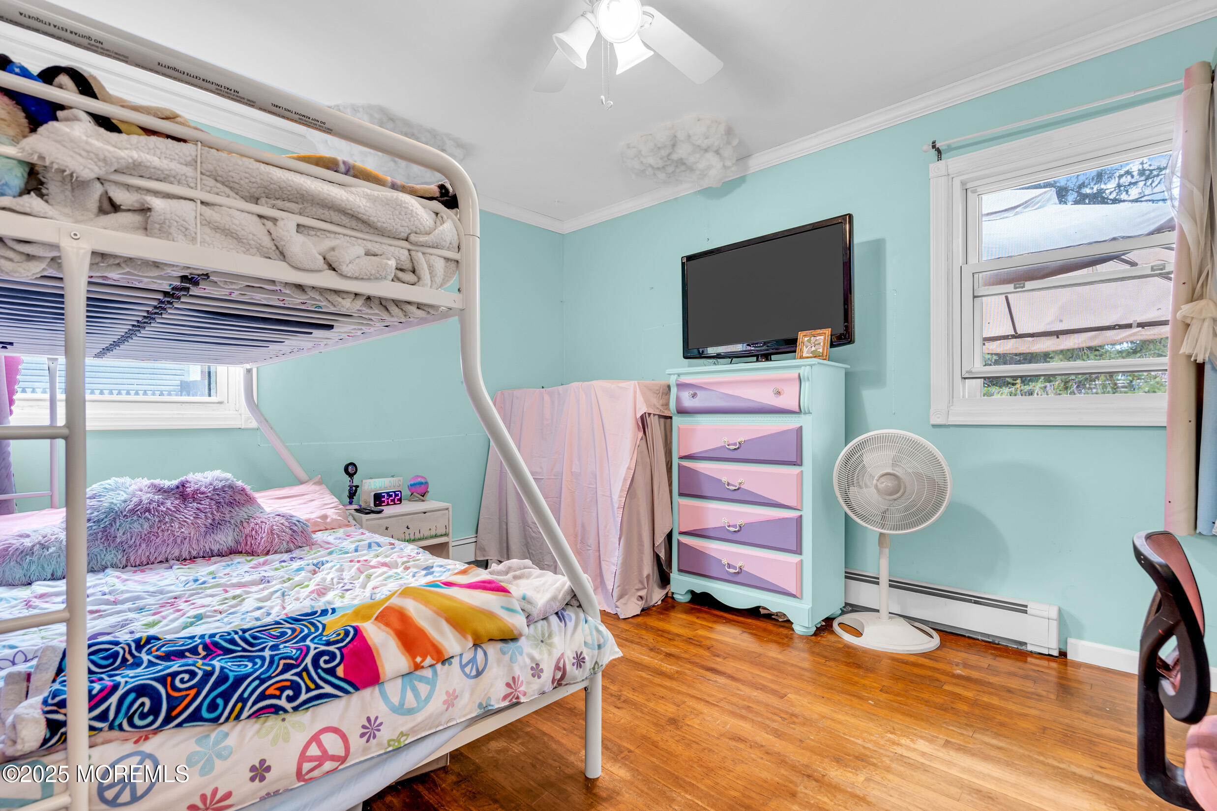 1541 Commonwealth Boulevard Toms River, NJ 08757 - Photo 19 of 34 a bedroom with a bed and flat screen tv