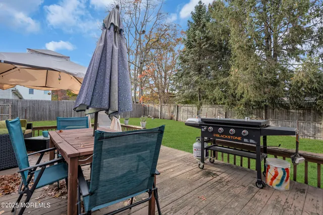 a view of an outdoor sitting area with furniture