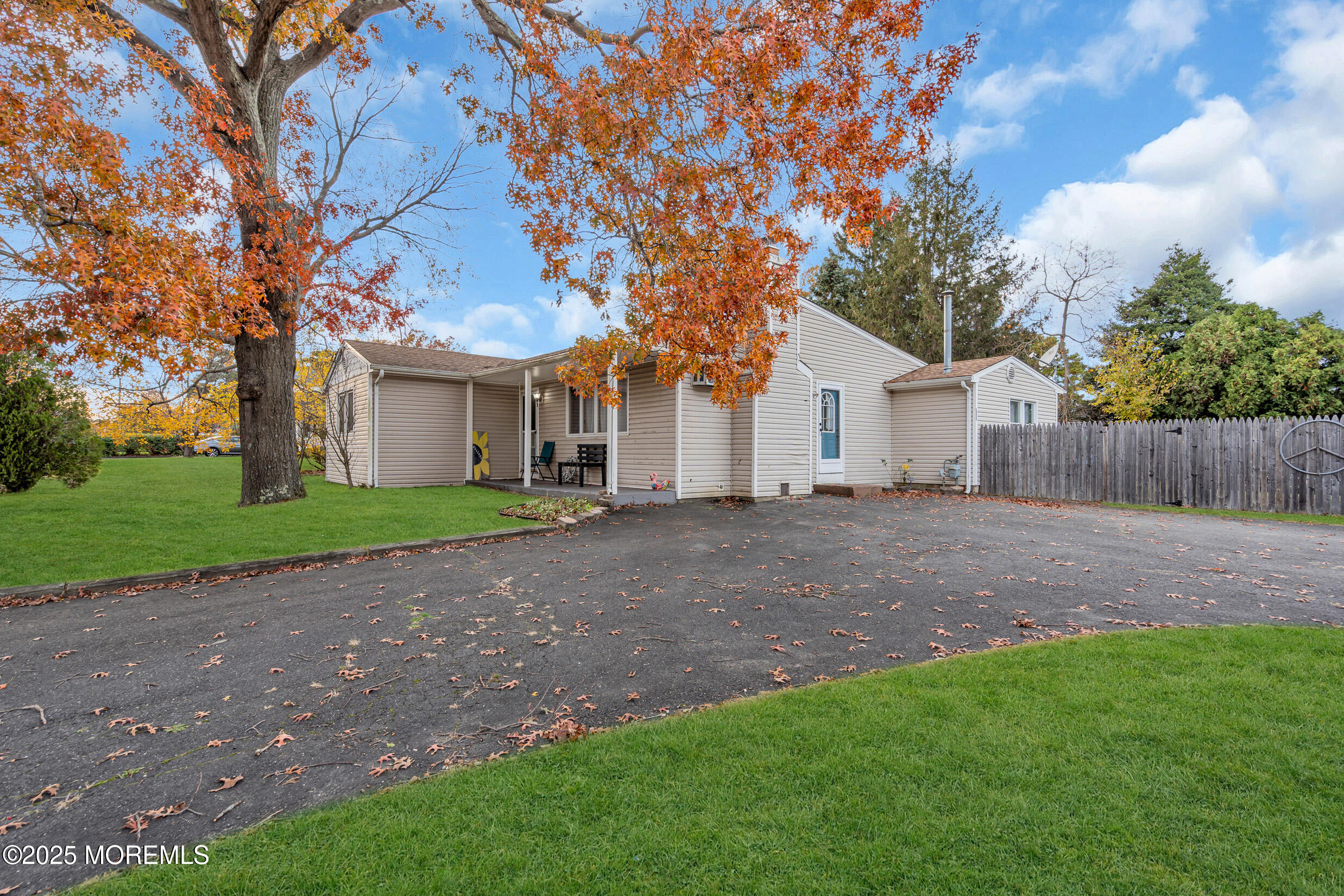 1541 Commonwealth Boulevard Toms River, NJ 08757 - Photo 30 of 34 a view of a house with a yard