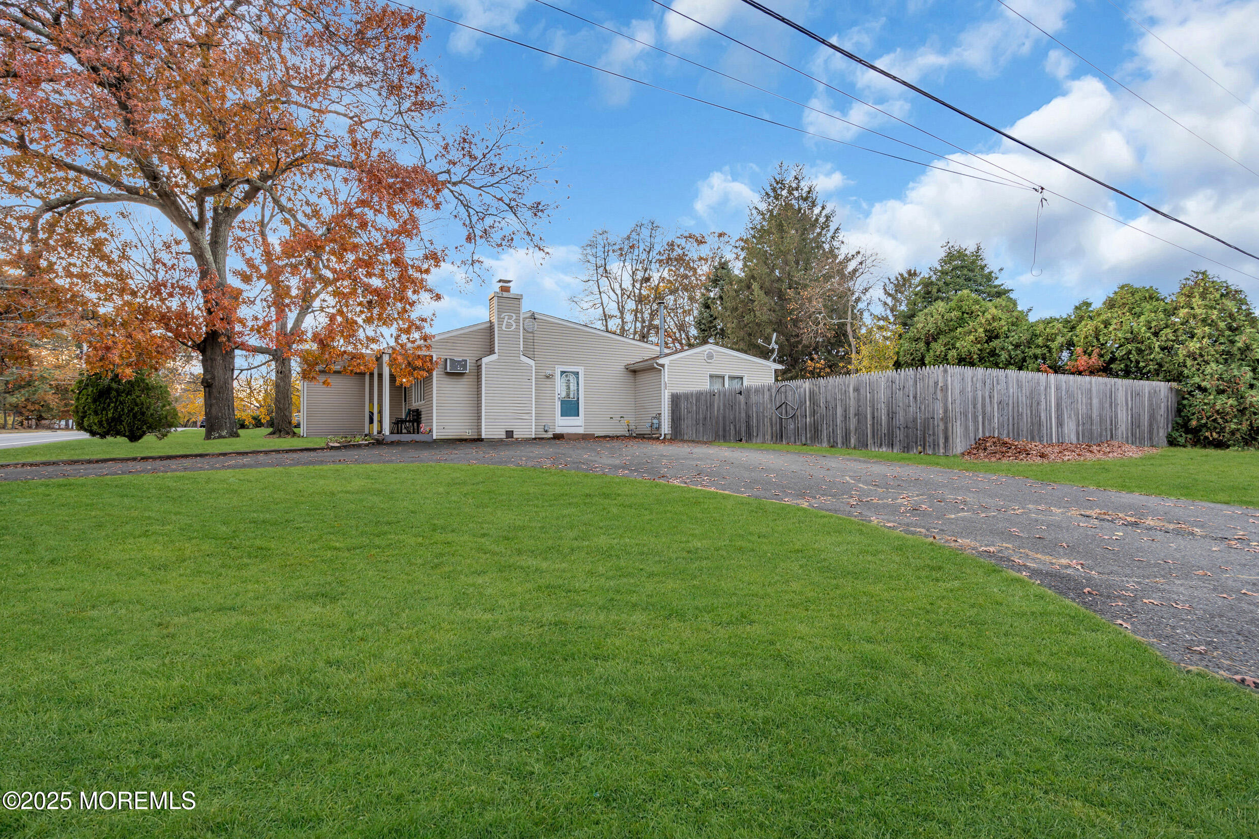 1541 Commonwealth Boulevard Toms River, NJ 08757 - Photo 31 of 34 a view of a house with a big yard