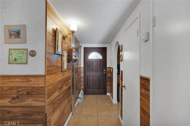 a view of hallway with a large mirror
