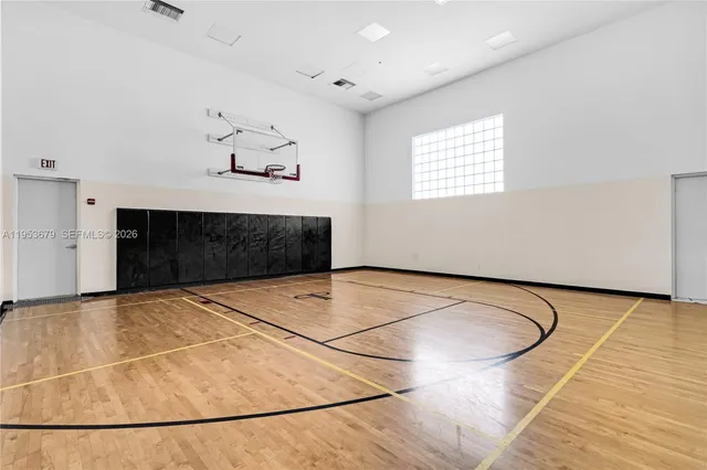 a view of a livingroom with a furniture and kitchen appliances
