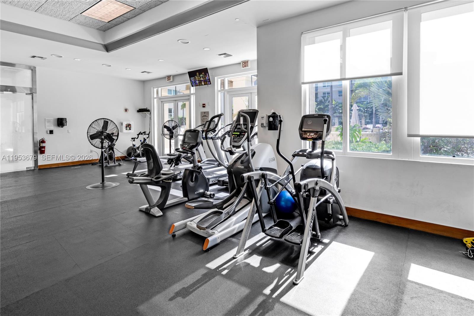 99 Southeast Mizner Boulevard, Unit PH16 Boca Raton, FL 33432 - Photo 23 of 30 a view of a room with gym equipment
