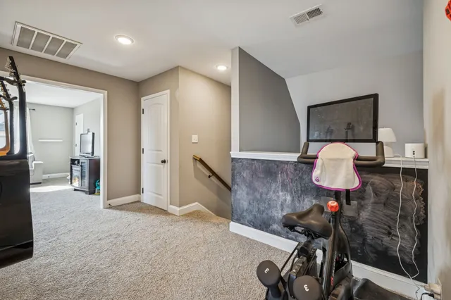 a view of a hallway with workspace