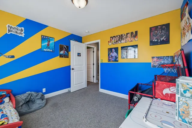 a room with furniture and screen