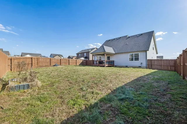 a house view with garden space