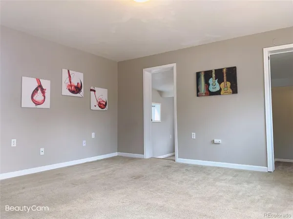 an empty room with shelves