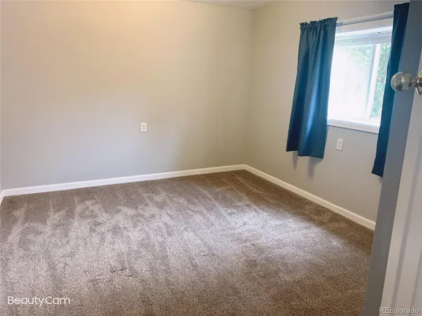 an empty room with a window