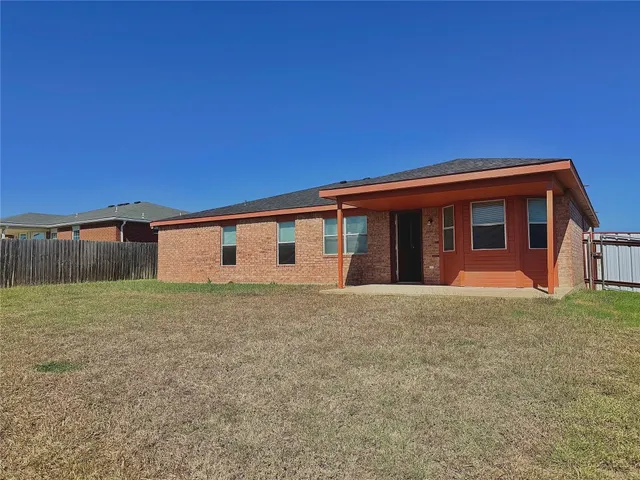 a front view of house with yard