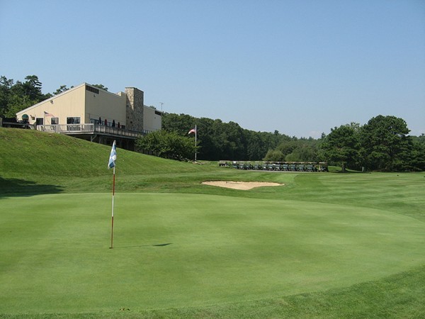 174 Lowell Road, Unit 82 Mashpee, MA 02649 - Photo 15 of 16 a view of a house and a yard