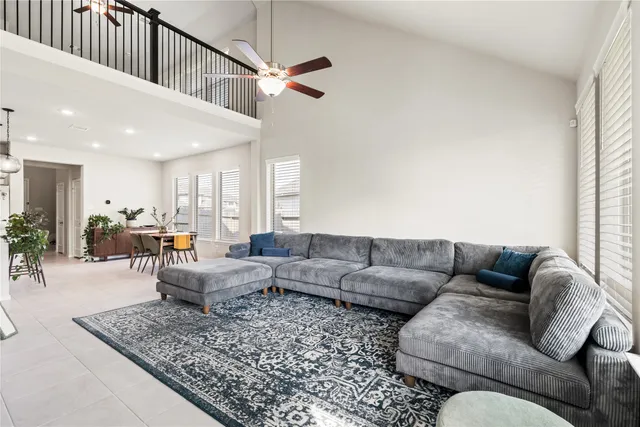 a living room with furniture and a couch