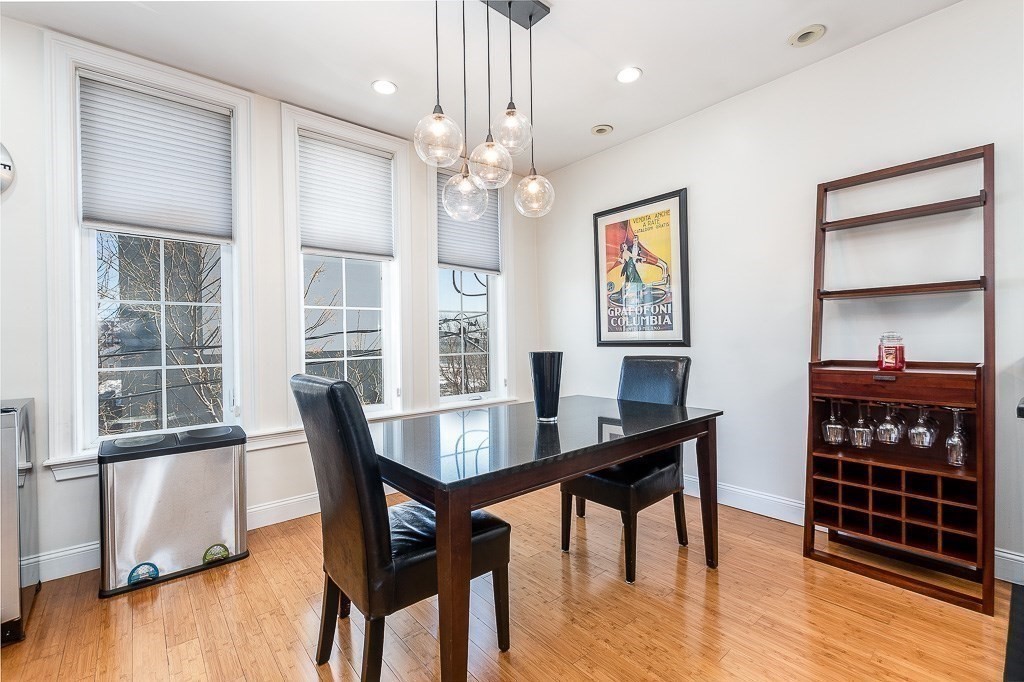 151 G Street, Unit 3 Boston, MA 02127 - Photo 12 of 33 a view of a dining room with furniture window and wooden floor
