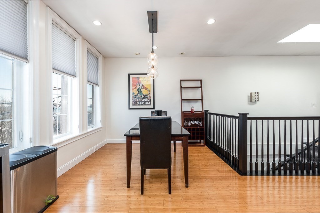 151 G Street, Unit 3 Boston, MA 02127 - Photo 13 of 33 a view of a livingroom with furniture wooden floor and windows