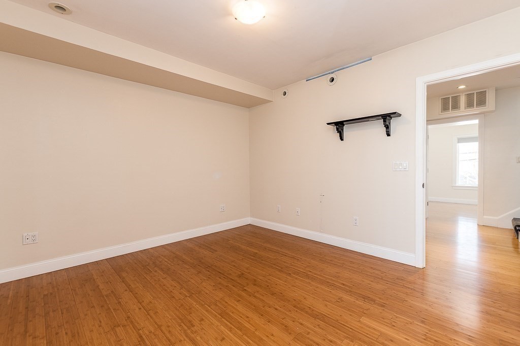 151 G Street, Unit 3 Boston, MA 02127 - Photo 24 of 33 a view of a room with wooden floor