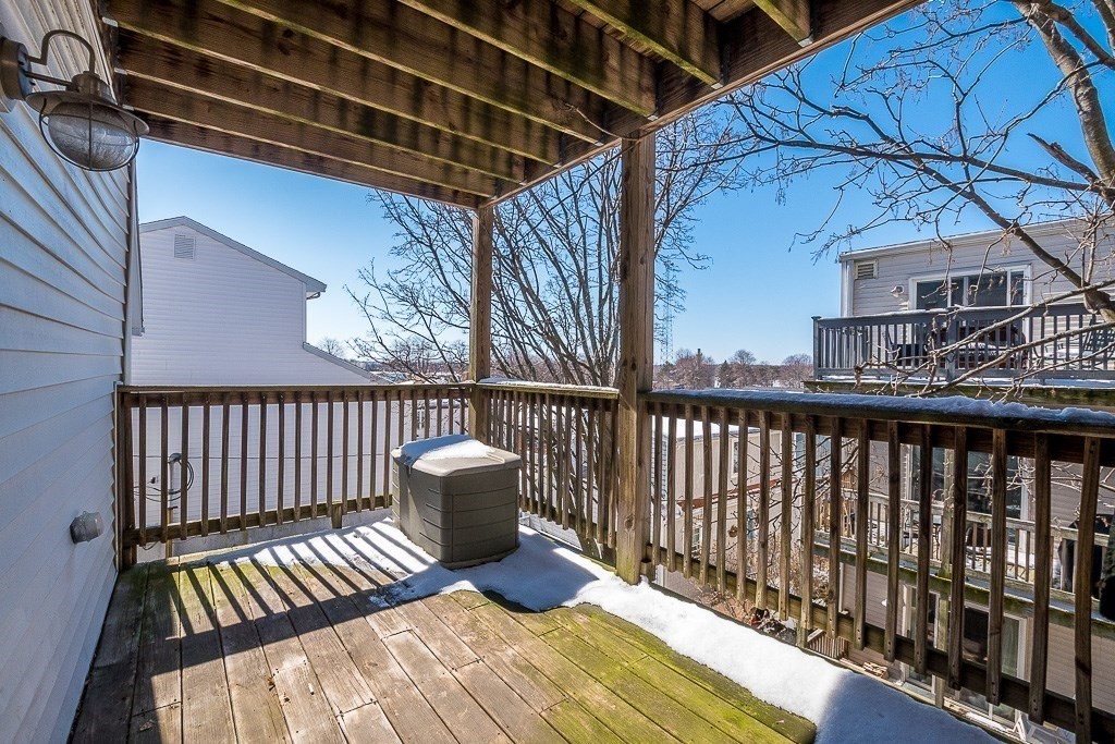 151 G Street, Unit 3 Boston, MA 02127 - Photo 32 of 33 a view of balcony with wooden floor
