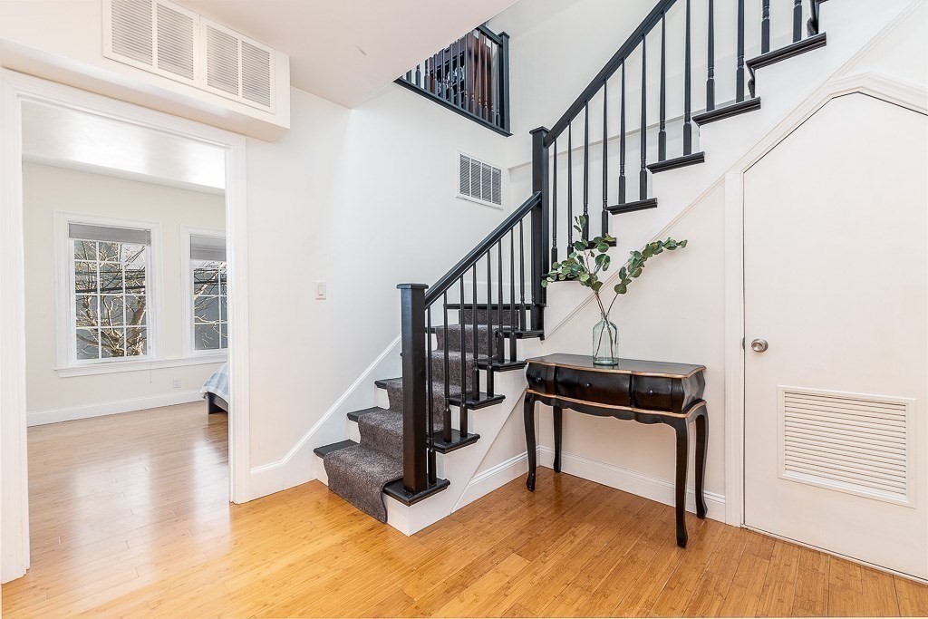 151 G Street, Unit 3 Boston, MA 02127 - Photo 4 of 33 a view of entryway and hall with wooden floor