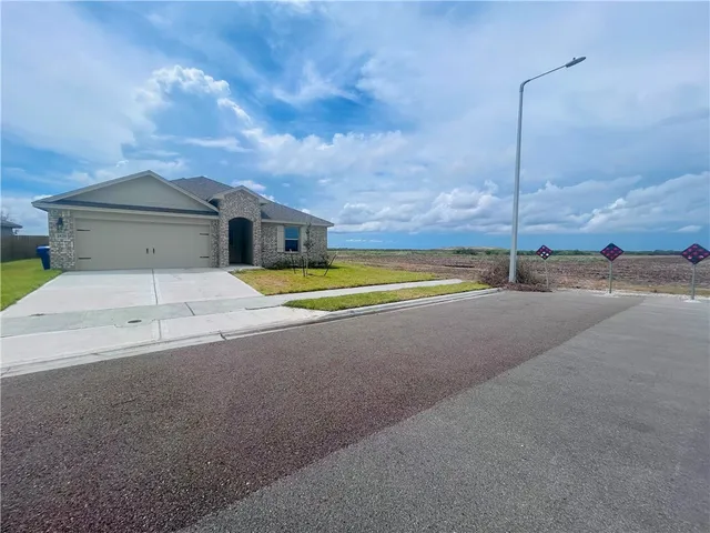 a view of a house with a swimming pool