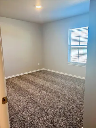 an empty room with a natural light