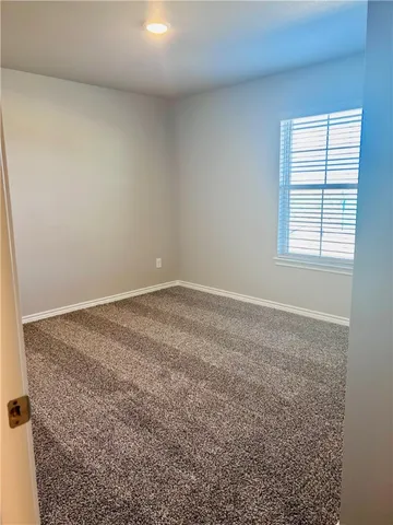 an empty room with a natural light