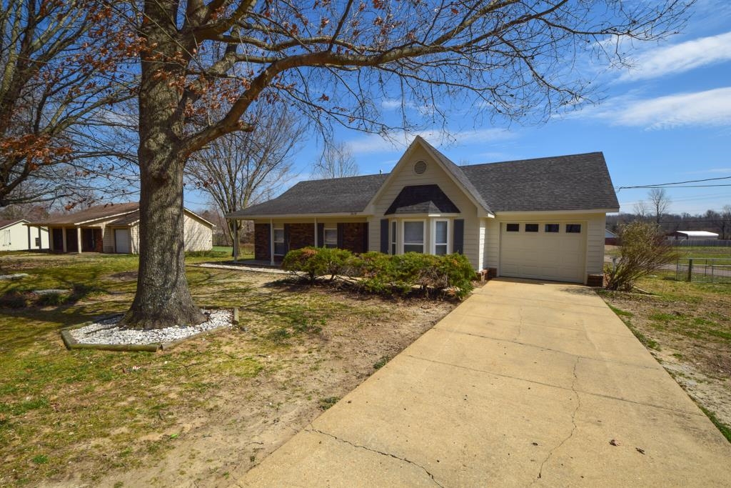 1618 Mathis Road Drummonds, TN 38023 - Photo 1 of 11 Ranch-style house featuring a garage