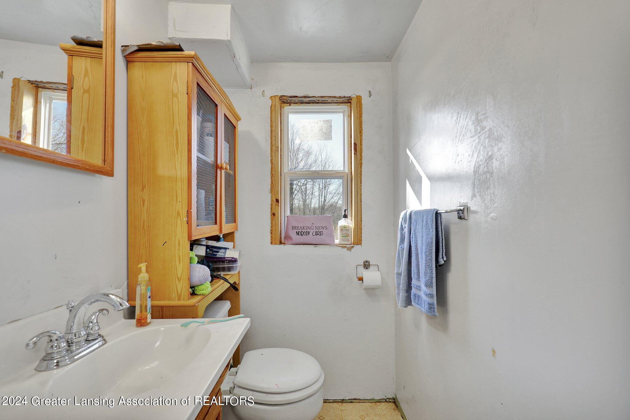 2369 North Gunn Road Holt, MI 48842 - Photo 25 of 31 11. Upstairs Half Bath