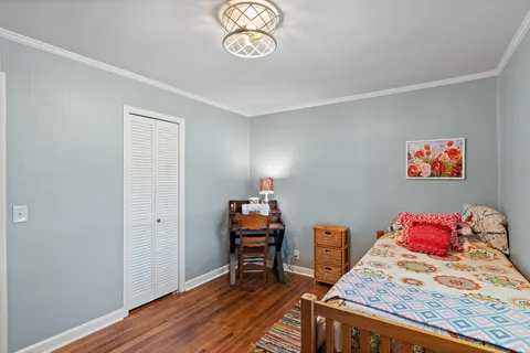 a workspace with furniture and wooden floor