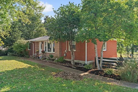 a backyard of a house with seating space